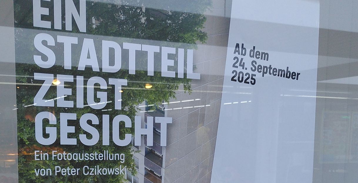 Plakat mit Titel "Ein Stadtteil zeigt Gesicht "
