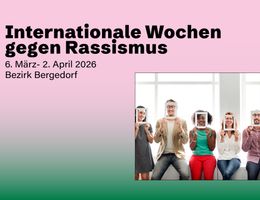 diverse group of people holding up white frames to their faces