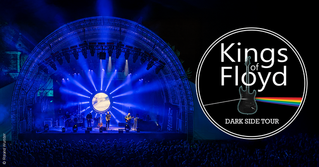 Bühnenauftritt der Band Kings of Floyd während der Dark Side Tour mit Lichteffekten und großem Publikum.