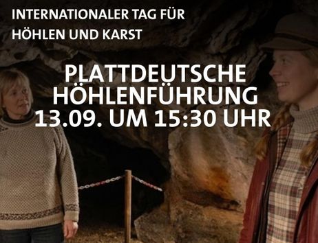 two women in a cave, talking