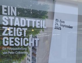 Plakat mit Titel "Ein Stadtteil zeigt Gesicht "